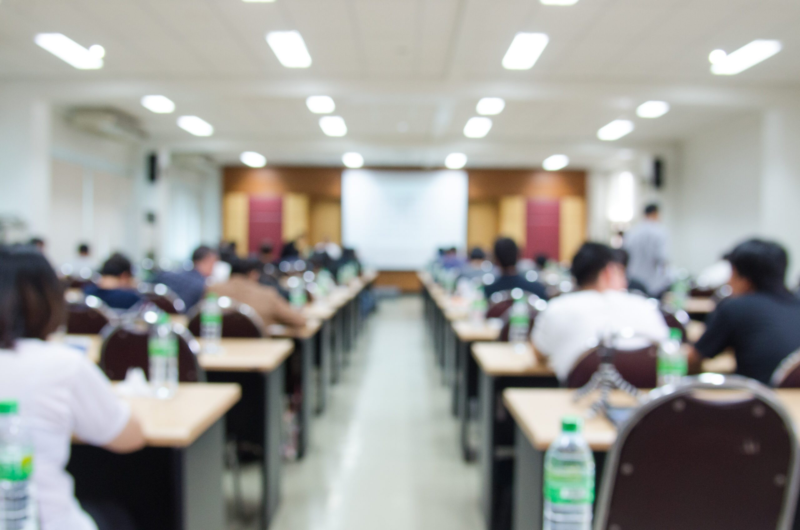 Abstract blur background of conference hall or seminar room.